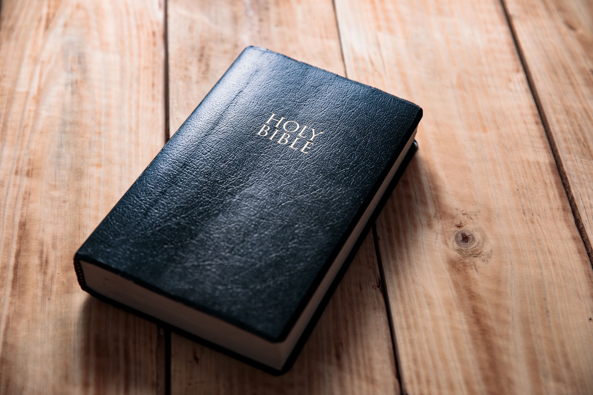 Holy Bible on the wooden table